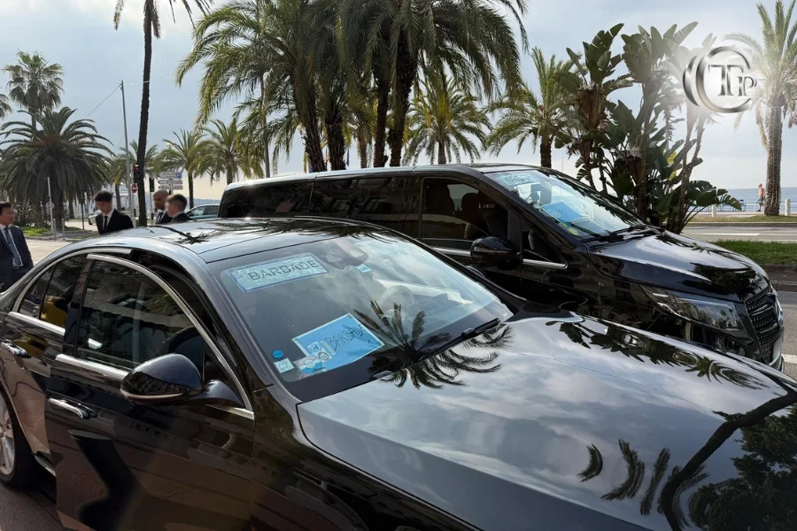 Luxury black Mercedes vehicles from CTP parked on the Promenade des Anglais for the Ocean Conference in Nice.