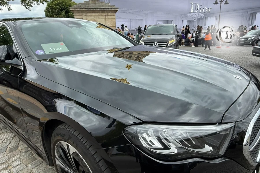 Black Mercedes with Dior sign at Paris Fashion Week by CTP Limo.