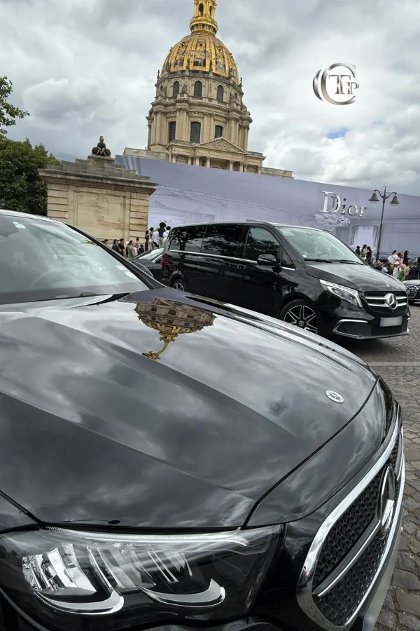 Black Mercedes reflecting Les Invalides dome at Dior Paris Fashion Week.