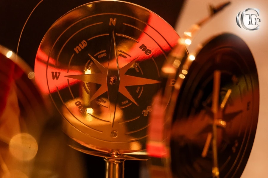 Close-up of the World Luxury Travel Award trophy featuring the iconic golden compass.